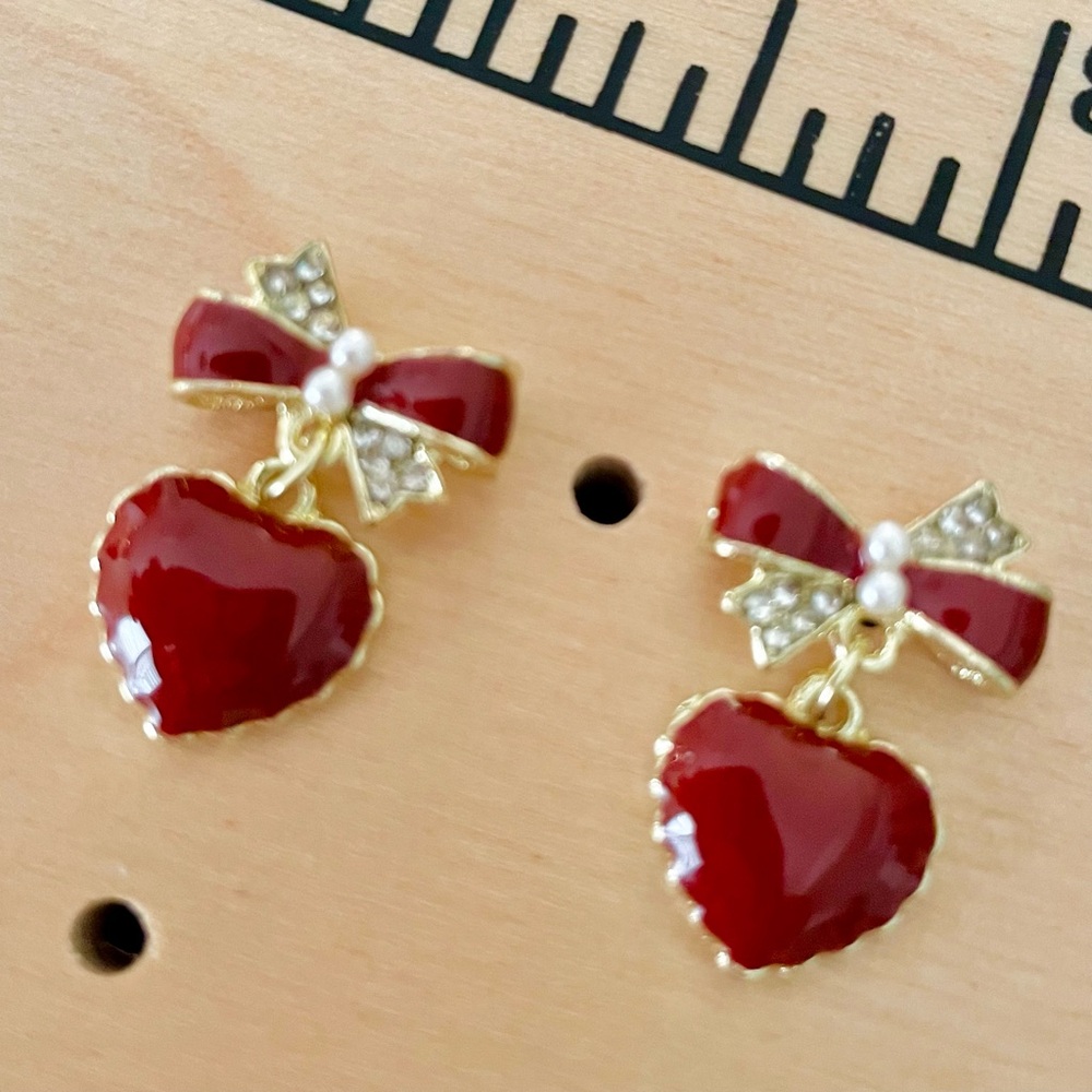 Sassy/Sweet Elegant Red Heart Earrings with Bow and pearlized seed beads.